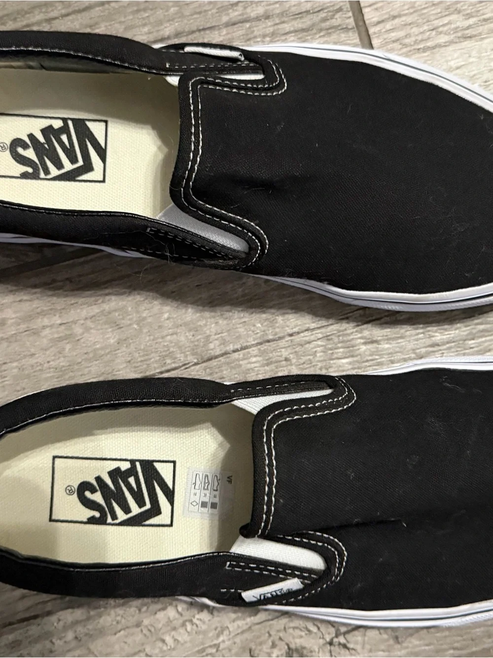 Vans Kids Black & White Slip-On Canvas Sneakers